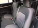 2016 Ford Explorer - The interior of a 2016 Ford Explorer shows gray fabric seats and black door panels.