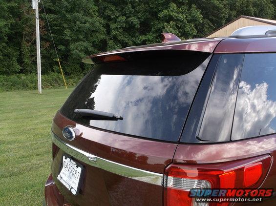 Maroon SUV rear view with license plate G429387 and 2016 model year
