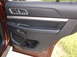 2016 Ford Explorer - Close-up of the interior door panel, showing the handle and storage compartment.