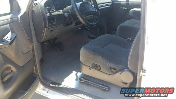 1992 Ford Bronco interior showing front seats, dashboard, and steering wheel