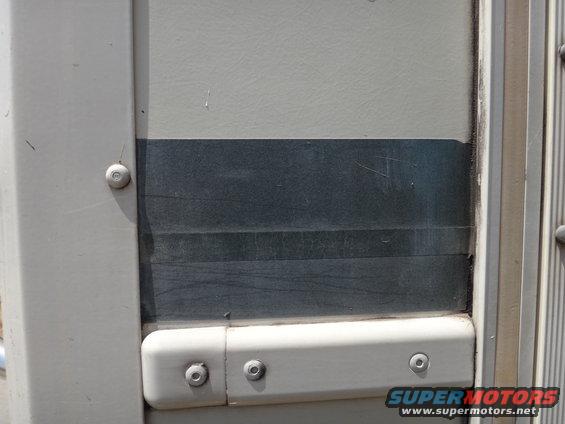 Step van door panel with gray and white sections and a dark horizontal stripe