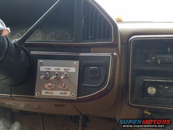 Dashboard with toggle switches labeled FUEL, FAN, BATT, HELLA, REAR, and a JVC stereo