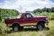 1995 Ford Bronco - This Ford Bronco is shown from the side with a spare tire mounted on the back.