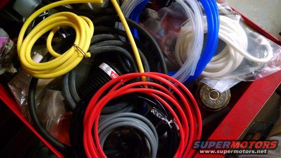 siliconevac.jpg Instead of relying on the antique hard-plastic vacuum lines or new vulcanized rubber, I collected several colors of 3mmIDx8~9mmID color-matched silicone tubing from eBay. It won't harden, melt, crack, tear, or degrade from UV. Black is usually ~$0.50/ft (~$1.5/meter); colors are about double that.

[url=https://www.supermotors.net/registry/media/1166439][img]https://www.supermotors.net/getfile/1166439/thumbnail/hvacvac.jpg[/img][/url] . [url=https://www.supermotors.net/registry/media/1151310][img]https://www.supermotors.net/getfile/1151310/thumbnail/09vacsilicone.jpg[/img][/url] . [url=http://www.supermotors.net/registry/media/894687][img]http://www.supermotors.net/getfile/894687/thumbnail/vaclinesefi.jpg[/img][/url] . [url=http://www.supermotors.net/registry/media/767412][img]http://www.supermotors.net/getfile/767412/thumbnail/recircline.jpg[/img][/url]