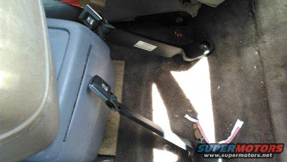 kimg0113.jpg mount the buckles in the direction you need to clear center console. mine were still loose but the sleeve helded alot. you may need to use washers to take up slack in the bolt