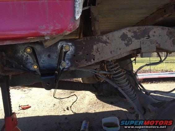oiling the hell out of the new rear spring hanger