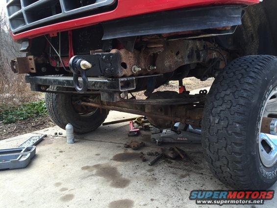 Painted crossmember, springs installed, under the truck