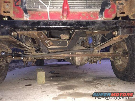 90s F350 drag link attached to 79 bronco center link.  TRE hole where drag and center meet is at an up angle so it throws off the drag link geometry.  Also, drop pitman arm show runs into leaf spring.