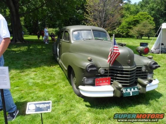 1942 Cadillac Series 62 sedan, military green, 3q-front view