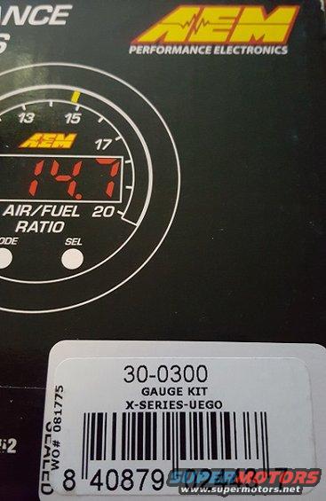 AEM X-Series UEGO gauge kit box with air/fuel ratio gauge visible