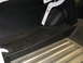 1967 Ford Mustang - Close-up view of the trunk area of a vehicle, showing the floor and side paneling.