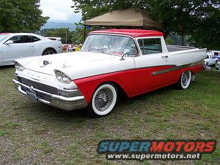 Two-tone red and white 1958 Ford Ranchero with wire wheels