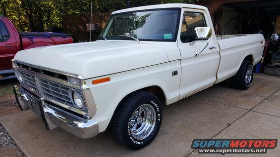 White 1973 Ford F-100 pickup truck, 3/4 front view