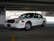 2000 Ford Crown Victoria - A white 2000 Ford Crown Victoria is parked in a covered area, showing its front quarter profile.