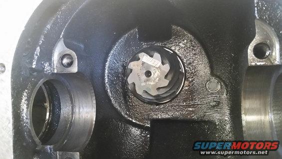 Close-up of differential gear with visible part numbers