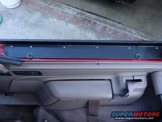 1994 Ford Bronco interior door panel with seatbelt