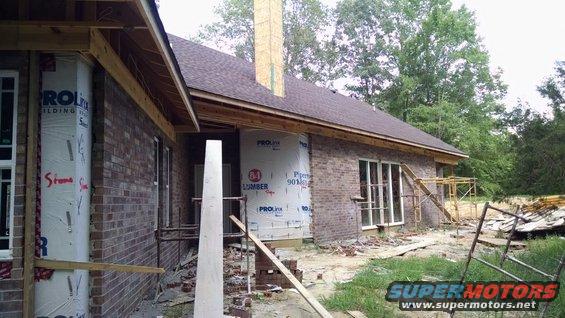 img_20160803_160603704.jpg The South & SW sides' brick is done.