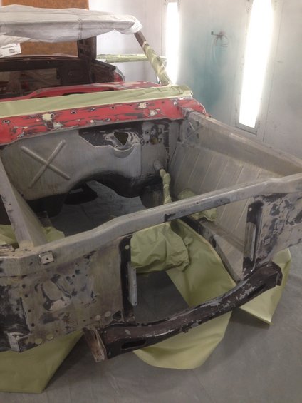 1964 Ford Fairlane front body section being prepped for paint