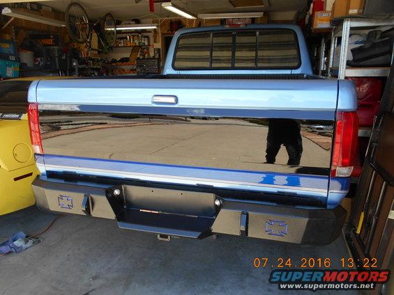 Blue 1996 Ford F-250 rear with custom bumper
