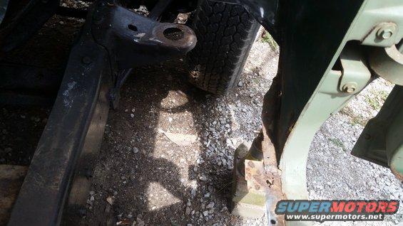 Vehicle frame and tire with rust damage