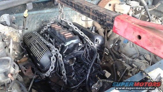 got the engine dropped in and bolted to the tranny

i decided im going to temporarily use the current tranny despite having almost no reverse since all forward gears are strong. that way i can get the engine broken in and tuned. also gets me some time to recover funds for the tranny rebuild