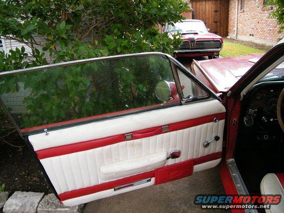1968 Mercury Cougar interior door panel with white and red upholstery