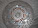 1971 Ford Ranchero - A close-up view of a clutch disc, showing its friction material and central splined hub.