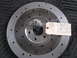 1971 Ford Ranchero - A close-up view of a clutch disc with a handwritten tag indicating its specifications.