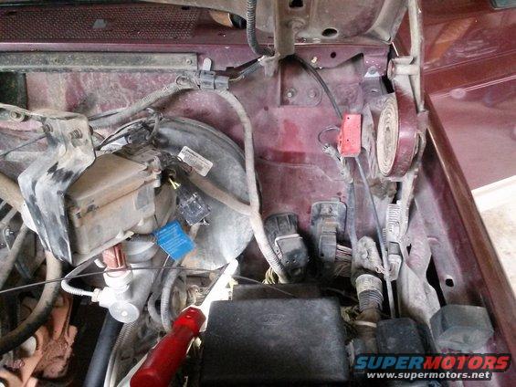 Engine bay wiring and brake booster assembly