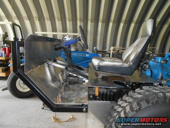 Custom off-road vehicle chassis with metal fabrication and a bucket seat