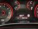 2015 Dodge Dart - Close-up of a car's interior dashboard, showing various gauges and a digital readout.