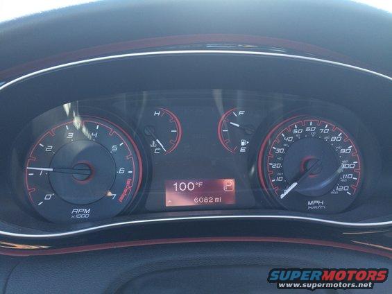 Dashboard gauges showing 100F and 6082 miles