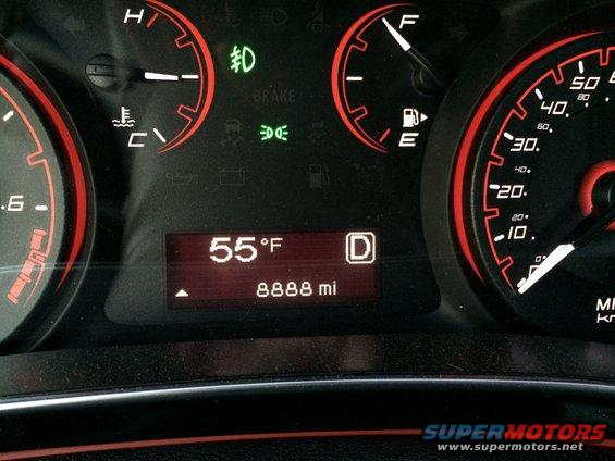 Dashboard gauges showing 55°F and 8888 miles