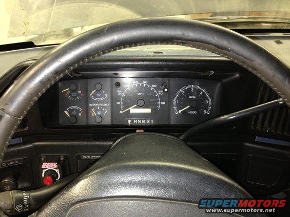 1988 Ford Bronco interior dashboard with speedometer and tachometer