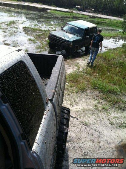 the night that ruined this truck. stuck for 10 hours and nobody couldget me out expeet my friend with a Dodge cummins on 46" tires. it ruined the frame and ripped the entire front clip from the mounts. this is why i later went to the 80-96 front clip with a steel pipe bumper holding the frame rails in place. even then i had to cut and highly modify the core support because the frame was soo bent out of place