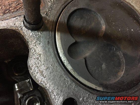 image.jpeg #8 piston, top edge damage 