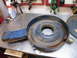 1968 Mercury Cougar - A blue air cleaner assembly, likely for an older vehicle, sits on a metal workbench.