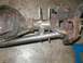 1994 Ford Bronco - Modified Dana 60 axle housing with suspension links, likely for off-road use.