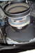 1990 Ford Bronco - Engine pulley and oil pan detail, showing dust and oil leaks.