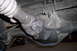 1990 Ford Bronco - Close-up view of the rear differential and driveshaft assembly, likely from a truck or SUV.