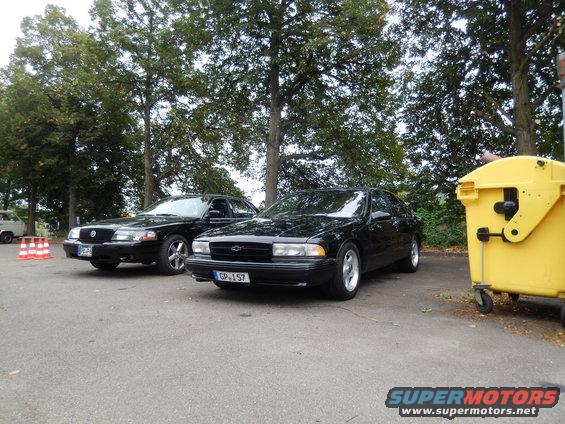 Black Mercury Marauder and Chevrolet Caprice parked side-by-side