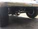 1962 Chevrolet Suburban - Underside view of a vehicle's rear axle, differential, and suspension system.