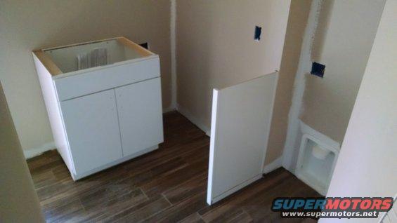 img_20161018_144543893.jpg The laundry counter will be L-shaped, and level with the dryer.