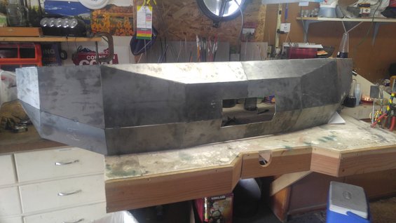 Custom metal bumper with cutouts on workbench