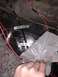 1996 Ford Bronco - Main power cord strapped down under passenger carpet.