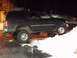 1998 Ford Expedition - This 1998 Ford Expedition is seen from the side, partially on a snowy incline.