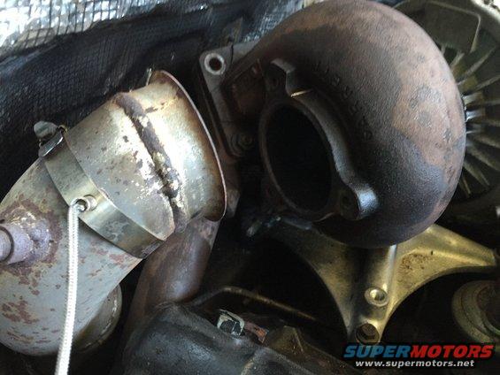 Turbocharger and exhaust pipe assembly, appears to be from a diesel engine