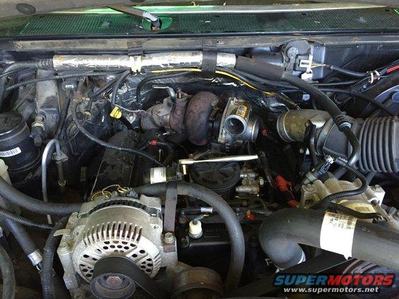 1997 Ford F-350 engine bay with turbocharger and alternator
