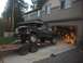 1978 Ford Bronco - This 1978 Ford Bronco is being transported on a trailer, showing its lifted stance and missing front end.