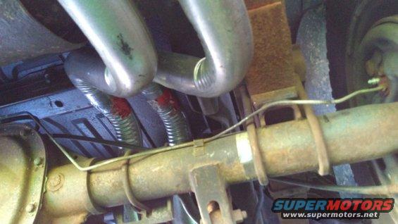 Here's both pipes running over the rear axle, lots of room.